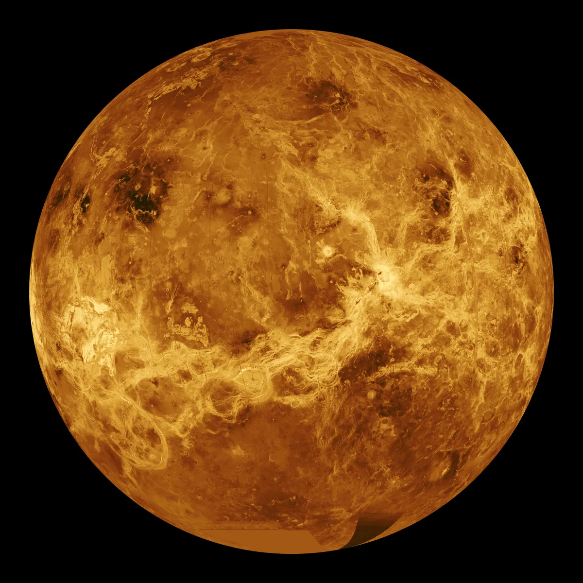 The globe of Venus in orange and gold, its surface mapped by radar, against a black background.