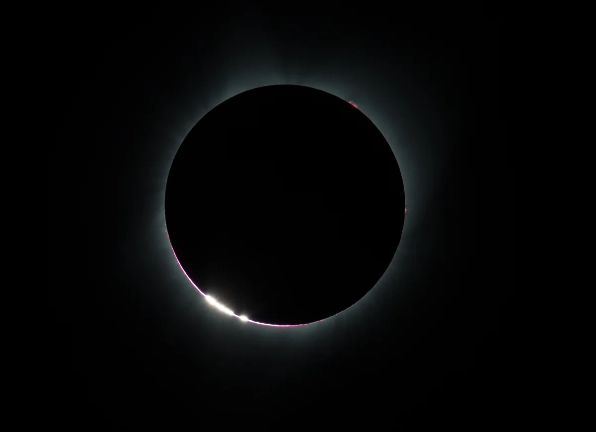 The total solar eclipse of 21 August 2017 seen from Madras, Oregon: the black disc of the moon ringed by bright points of sunlight
