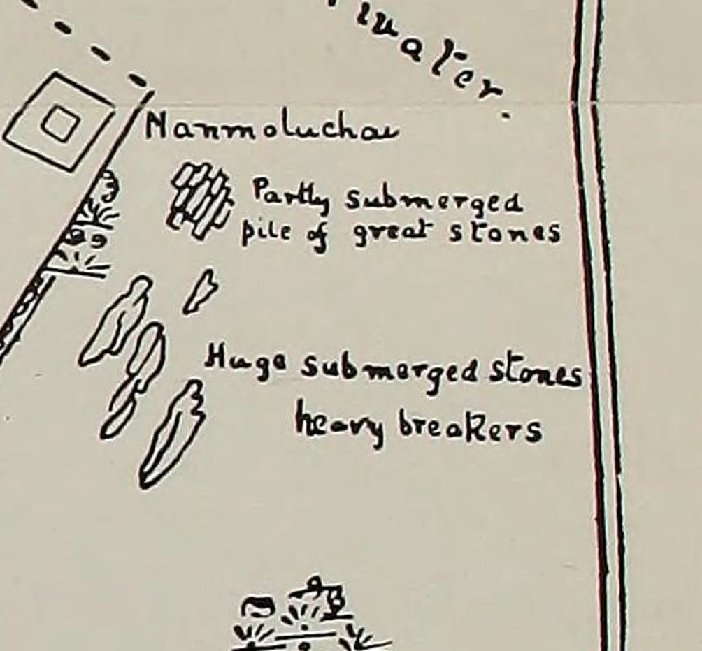 Detail of the hand-lettered plan: shapes off the end of the wall, labelled Partly submerged pile of great stones and Huge submerged stones, heavy breakers.