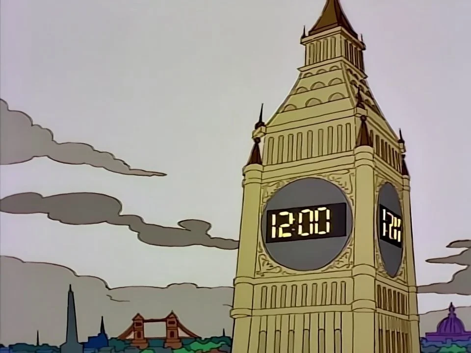 Big Ben with a digital clock face on the right, and low on the left horizon a tall thin dark spike by Tower Bridge.