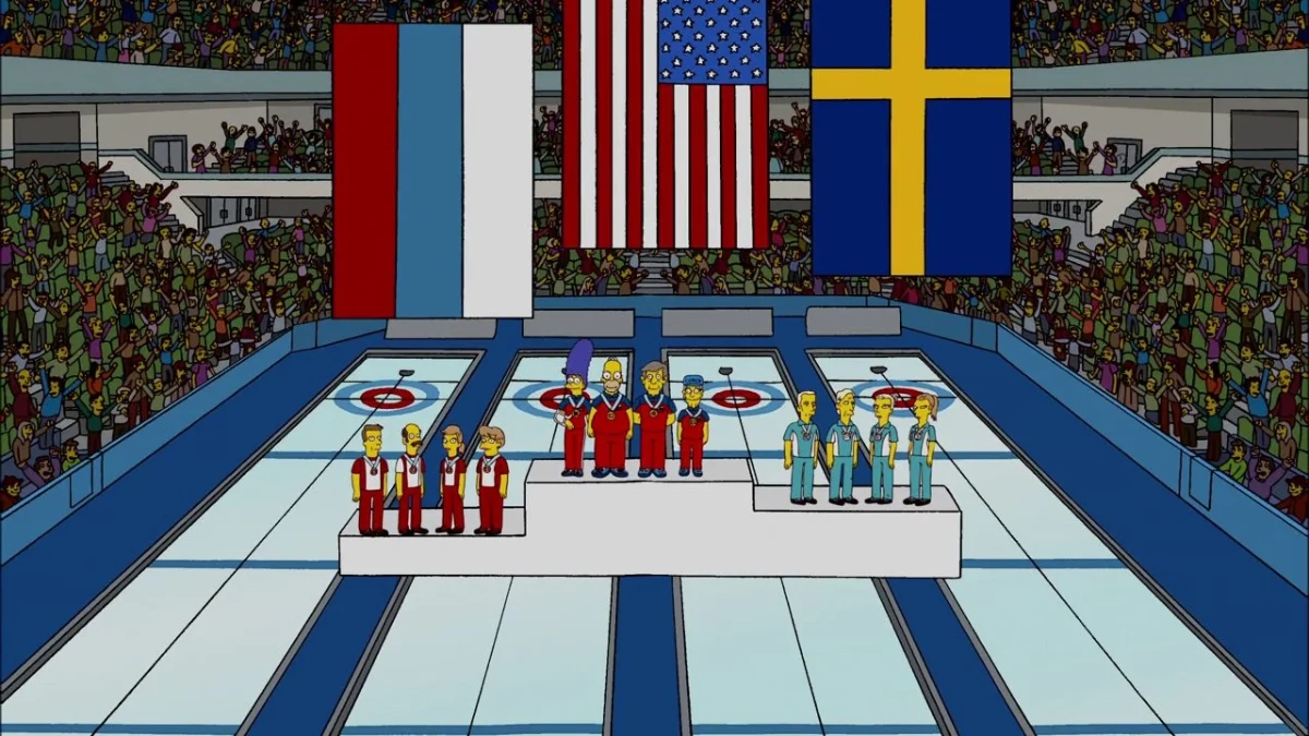 Homer, Marge and the Skinners in red on a podium under a US flag, a Swedish team on the step beside them.