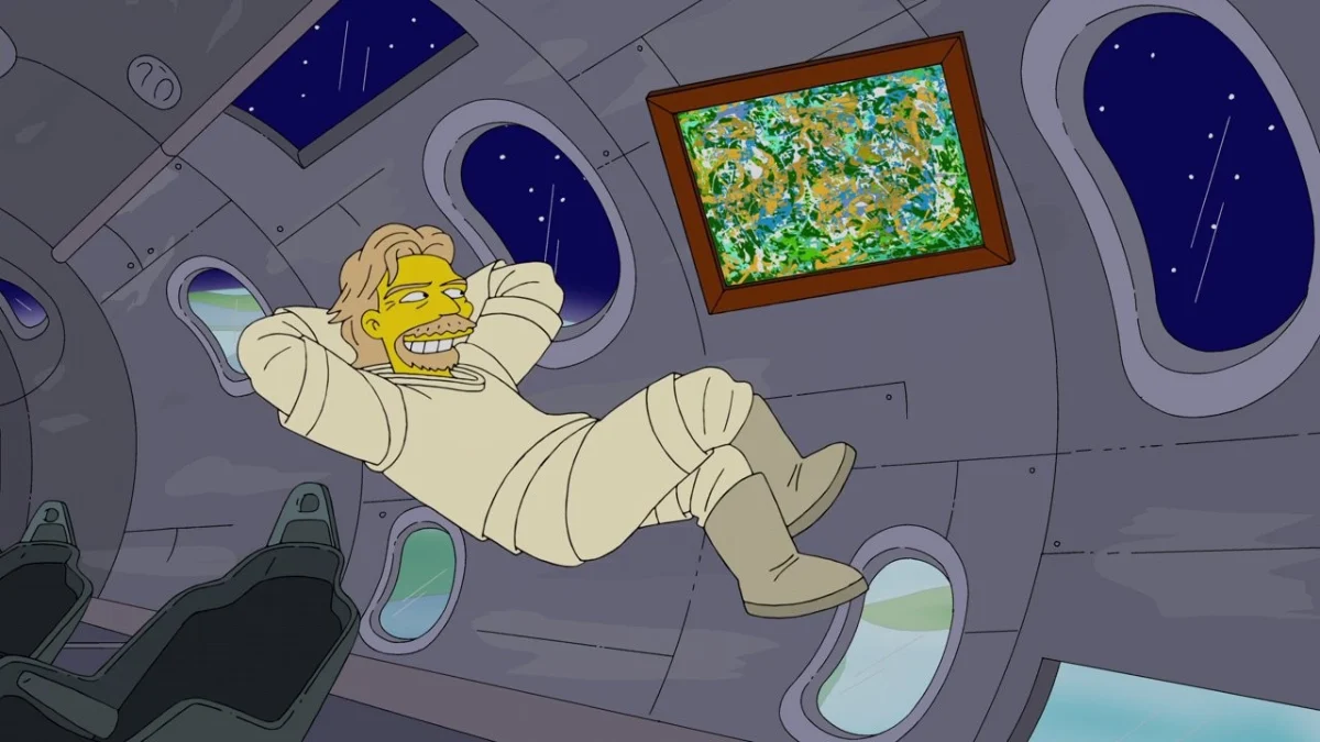A smiling man in a cream flight suit floating in a spacecraft cabin with oval windows, a framed painting on the wall.