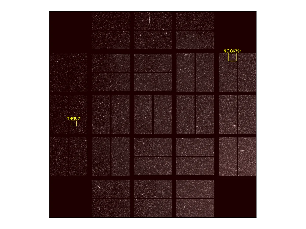 Kepler's first-light image: a dark mosaic of rectangular detector tiles sprinkled with stars, two of them labelled TrES-2 and NGC 6791