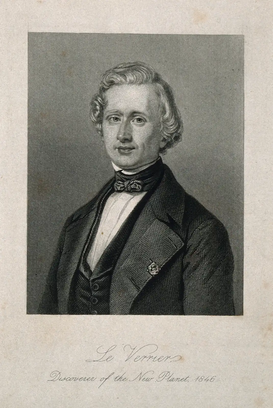 An engraved portrait of a young man with swept-back hair and a bow tie, with the signature Le Verrier and the words Discoverer of the New Planet, 1846